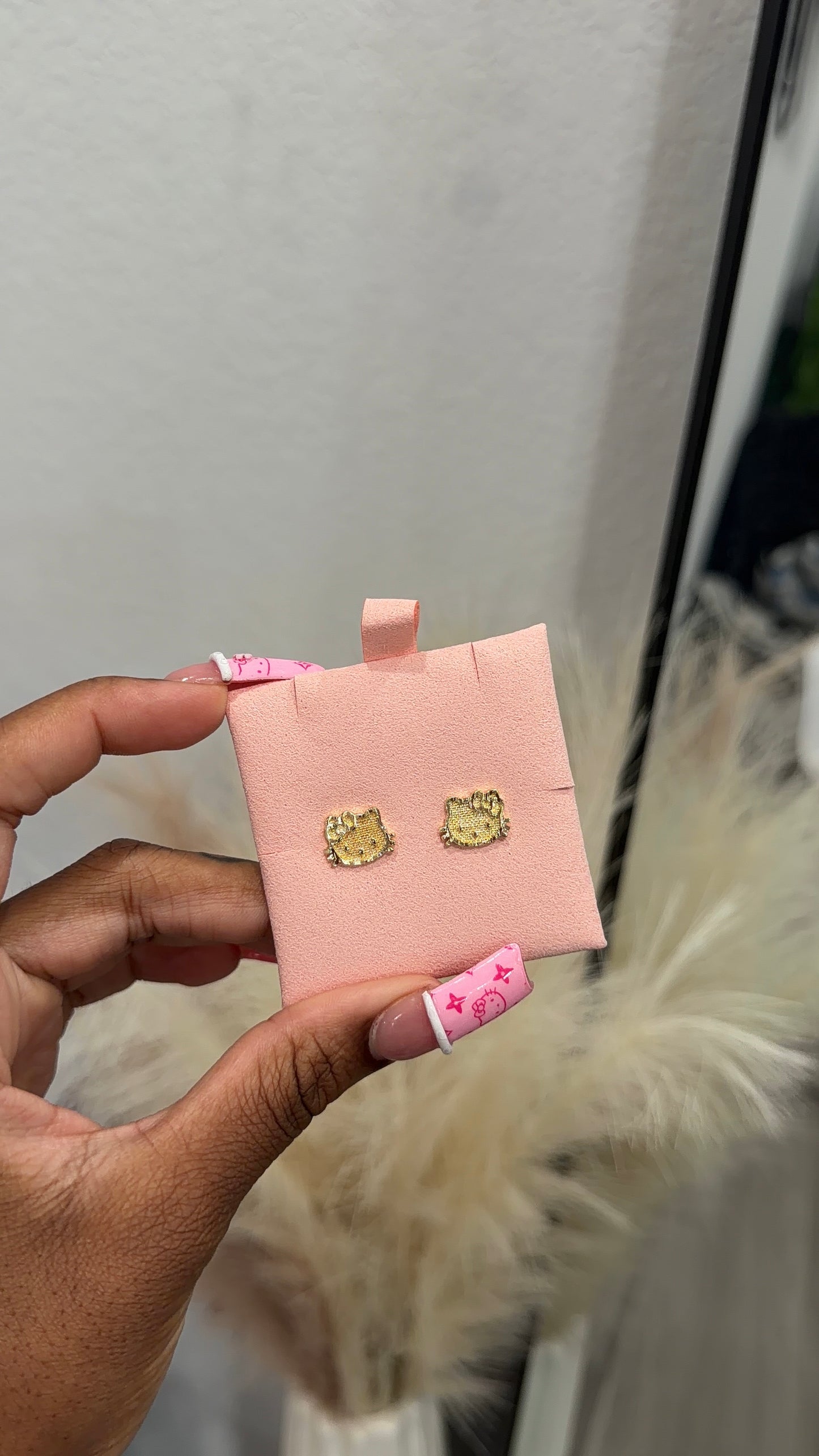 HK face earrings